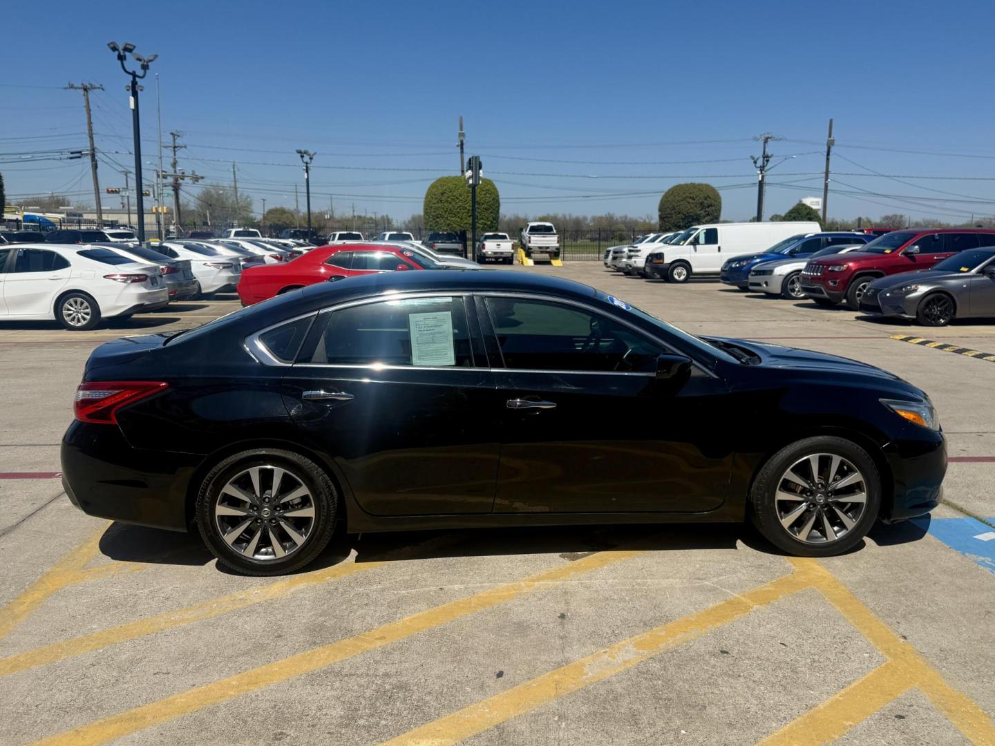 2017 Super Black /Beige, cloth Charcoal, cloth Nissan Altima 56189 (1N4AL3AP7HC) with an 2.5L L4 DOHC 16V engine, Continuously Variable Transmission transmission, located at 2401 E Main St., Grand Prairie, TX, 75050, (972) 262-4440, 32.748981, -96.969643 - Photo#5