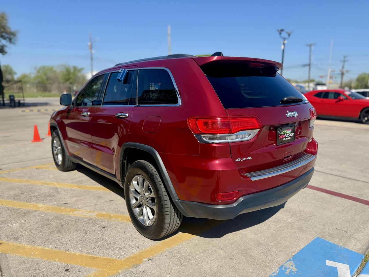 2015 Dp Cherry Red Crystal PC /Black Light Frost Beige/Black Jeep Grand Cherokee 50287 (1C4RJFBG3FC) with an 3.6L V6 DOHC 24V engine, 8-Speed Automatic transmission, located at 2401 E Main St., Grand Prairie, TX, 75050, (972) 262-4440, 32.748981, -96.969643 - Photo#5