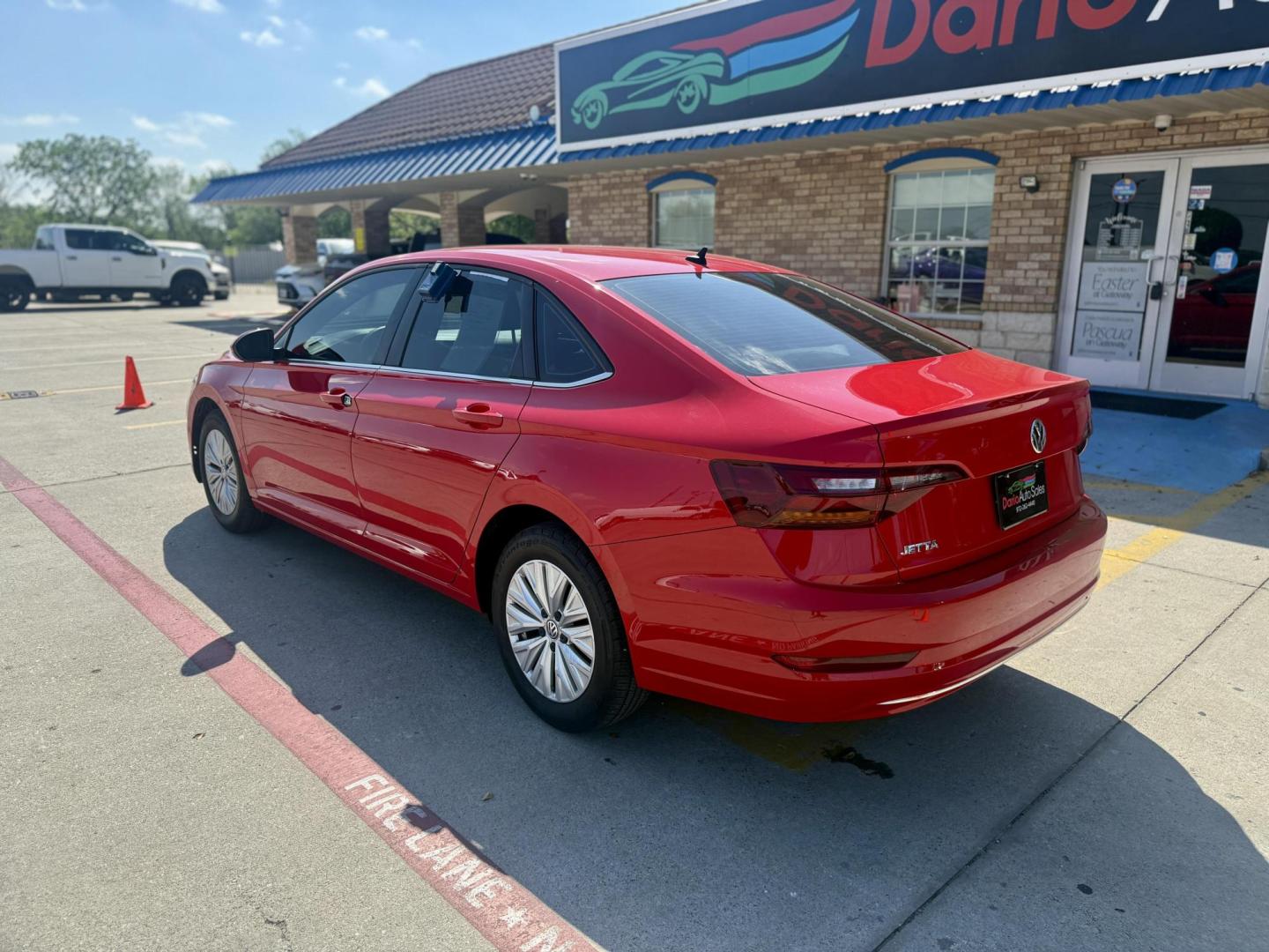 2019 Tornado Red /Storm Gray, cloth Titan Black, cloth Volkswagen Jetta 62580 (3VWC57BUXKM) with an 1.4L L4 DOHC 16V engine, 8-Speed Automatic transmission, located at 2401 E Main St., Grand Prairie, TX, 75050, (972) 262-4440, 32.748981, -96.969643 - Photo#2