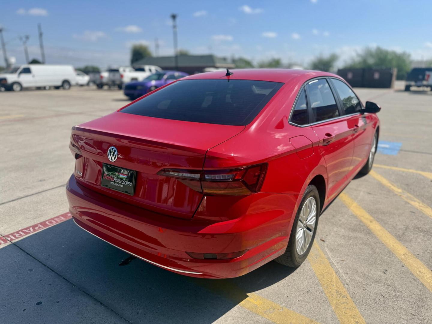 2019 Tornado Red /Storm Gray, cloth Titan Black, cloth Volkswagen Jetta 62580 (3VWC57BUXKM) with an 1.4L L4 DOHC 16V engine, 8-Speed Automatic transmission, located at 2401 E Main St., Grand Prairie, TX, 75050, (972) 262-4440, 32.748981, -96.969643 - Photo#4