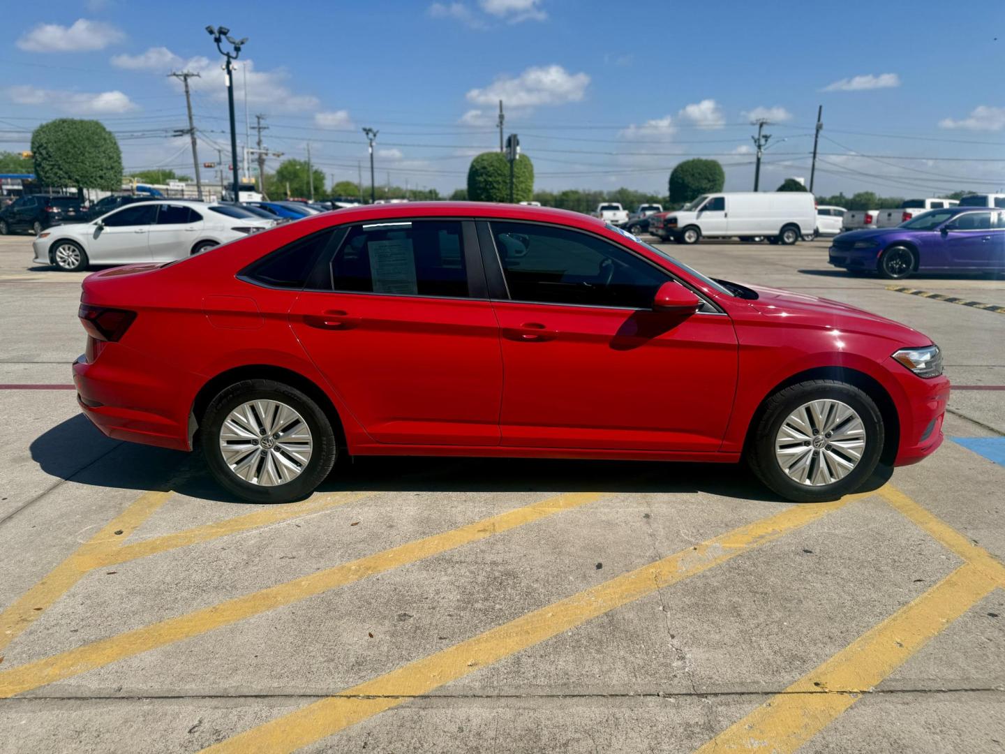 2019 Tornado Red /Storm Gray, cloth Titan Black, cloth Volkswagen Jetta 62580 (3VWC57BUXKM) with an 1.4L L4 DOHC 16V engine, 8-Speed Automatic transmission, located at 2401 E Main St., Grand Prairie, TX, 75050, (972) 262-4440, 32.748981, -96.969643 - Photo#5