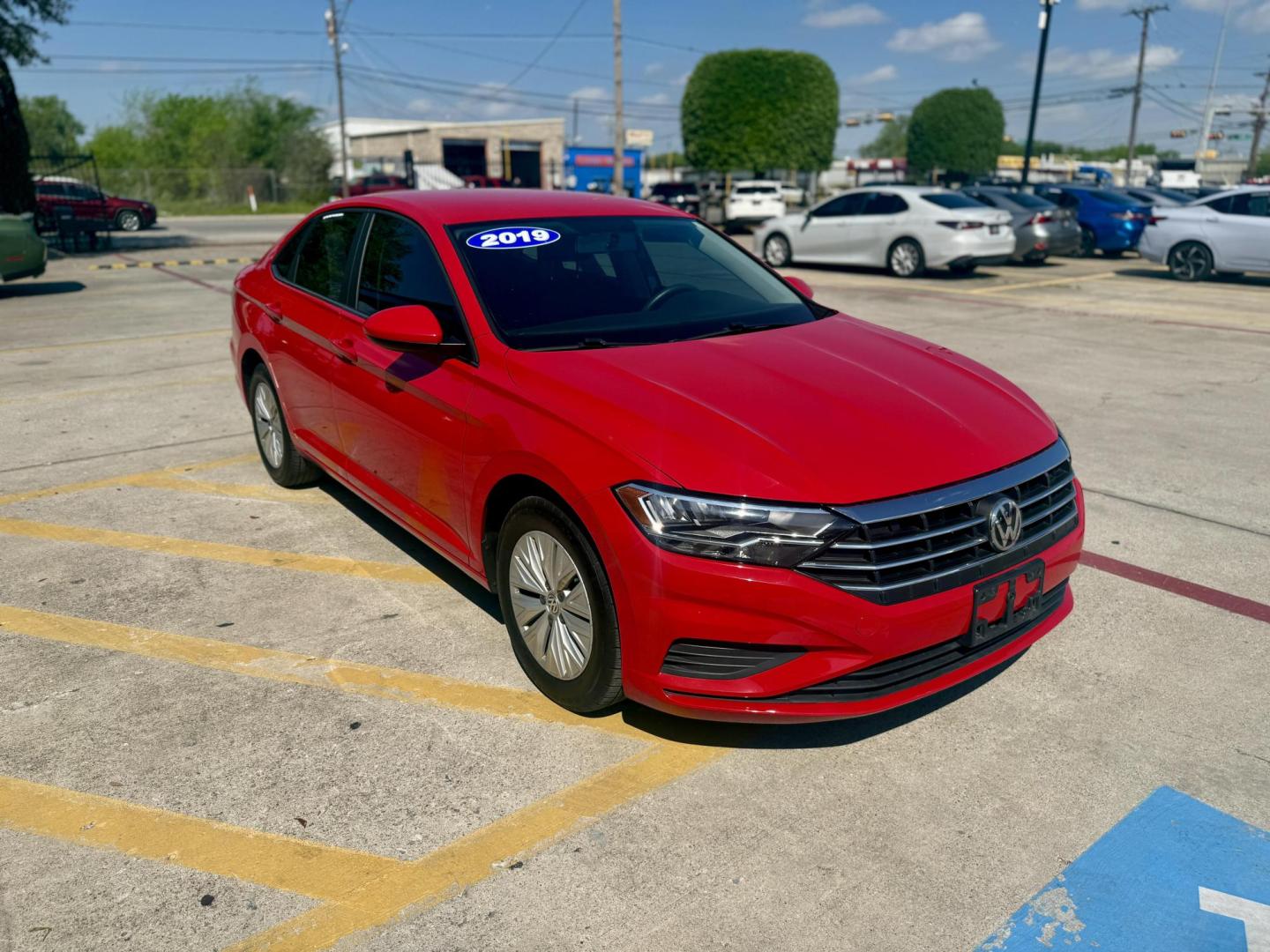 2019 Tornado Red /Storm Gray, cloth Titan Black, cloth Volkswagen Jetta 62580 (3VWC57BUXKM) with an 1.4L L4 DOHC 16V engine, 8-Speed Automatic transmission, located at 2401 E Main St., Grand Prairie, TX, 75050, (972) 262-4440, 32.748981, -96.969643 - Photo#6