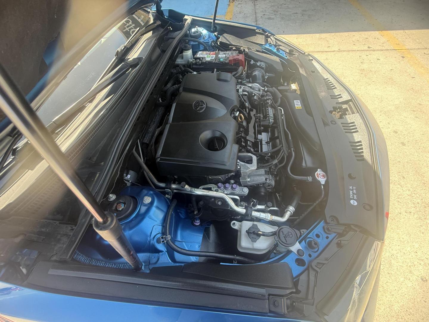 2018 Blue Crush Metallic /Ash, leatherette/cloth Black, leatherette/cloth Toyota Camry 59159 (4T1B11HK7JU) with an 2.5L L4 DOHC 16V engine, 8-Speed Automatic transmission, located at 2401 E Main St., Grand Prairie, TX, 75050, (972) 262-4440, 32.748981, -96.969643 - Photo#17