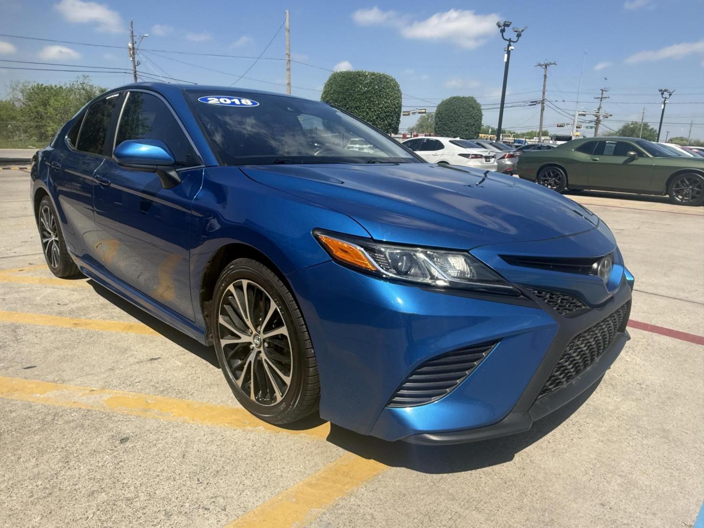 2018 Blue Crush Metallic /Ash, leatherette/cloth Black, leatherette/cloth Toyota Camry 59159 (4T1B11HK7JU) with an 2.5L L4 DOHC 16V engine, 8-Speed Automatic transmission, located at 2401 E Main St., Grand Prairie, TX, 75050, (972) 262-4440, 32.748981, -96.969643 - Photo#22