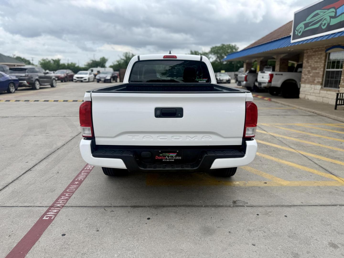 2016 Super White /Black/Caramel, cloth Black/Red, cloth Cement Gray, Toyota Tacoma 53500 (5TFRX5GN5GX) with an 2.7L L4 DOHC 16V engine, 6-Speed Automatic transmission, located at 2401 E Main St., Grand Prairie, TX, 75050, (972) 262-4440, 32.748981, -96.969643 - Photo#3