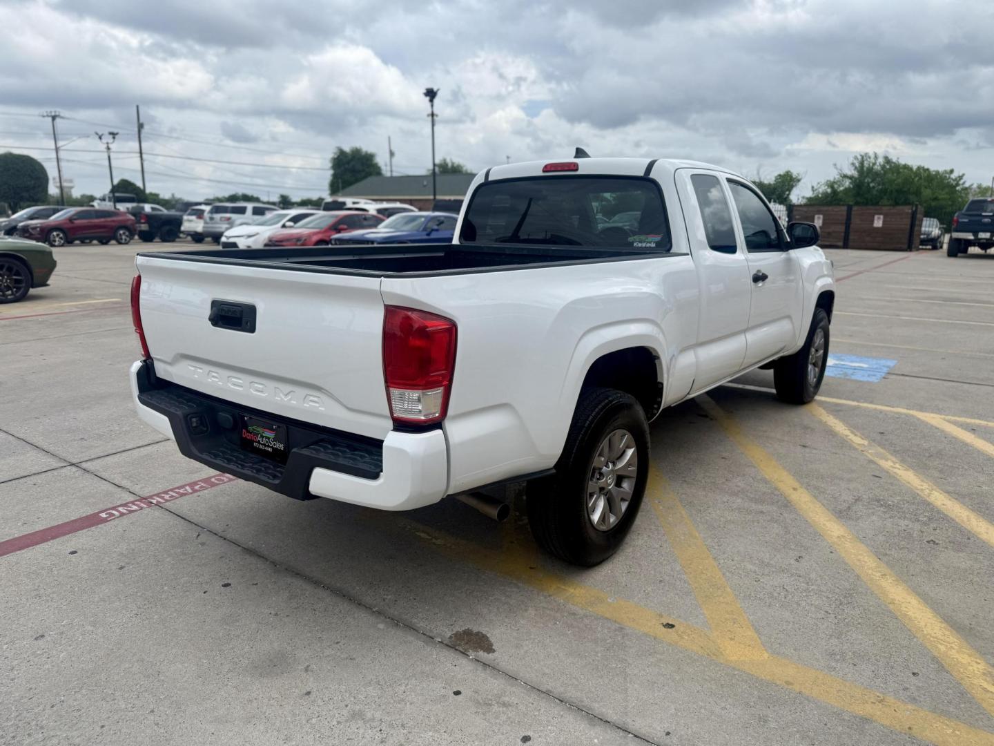 2016 Super White /Black/Caramel, cloth Black/Red, cloth Cement Gray, Toyota Tacoma 53500 (5TFRX5GN5GX) with an 2.7L L4 DOHC 16V engine, 6-Speed Automatic transmission, located at 2401 E Main St., Grand Prairie, TX, 75050, (972) 262-4440, 32.748981, -96.969643 - Photo#4