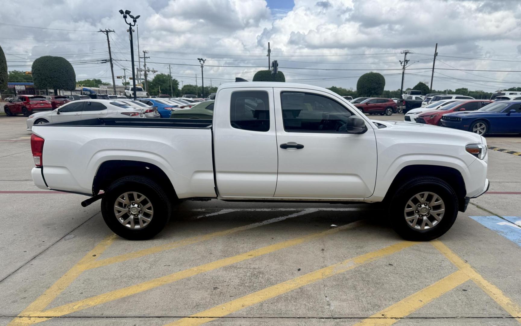 2016 Super White /Black/Caramel, cloth Black/Red, cloth Cement Gray, Toyota Tacoma 53500 (5TFRX5GN5GX) with an 2.7L L4 DOHC 16V engine, 6-Speed Automatic transmission, located at 2401 E Main St., Grand Prairie, TX, 75050, (972) 262-4440, 32.748981, -96.969643 - Photo#5