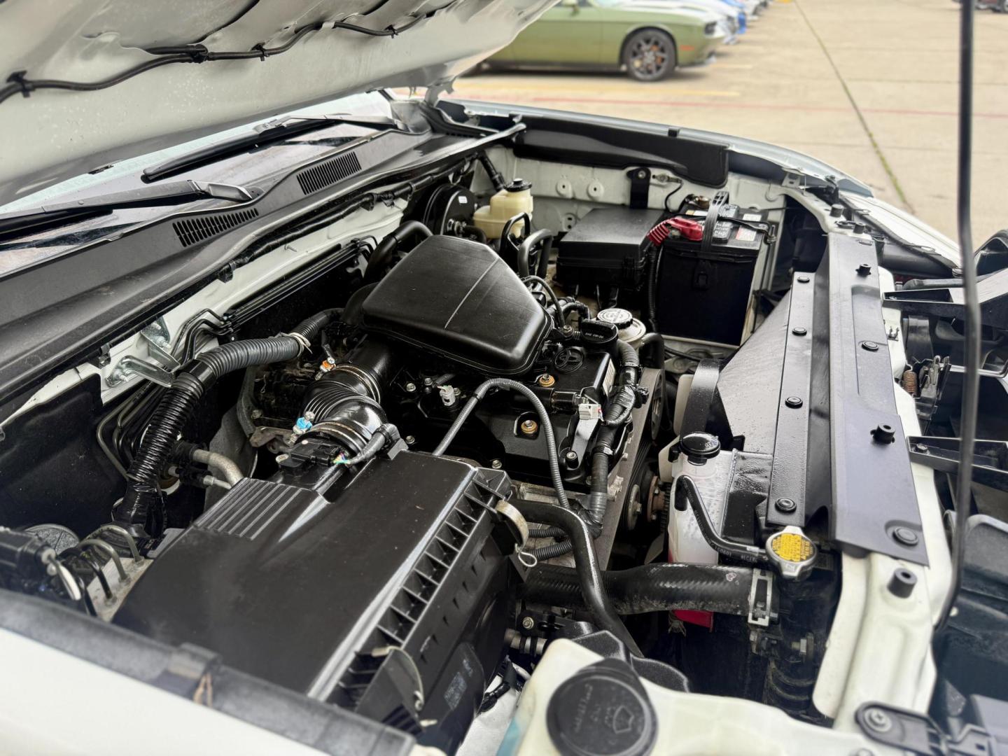 2016 Super White /Black/Caramel, cloth Black/Red, cloth Cement Gray, Toyota Tacoma 53500 (5TFRX5GN5GX) with an 2.7L L4 DOHC 16V engine, 6-Speed Automatic transmission, located at 2401 E Main St., Grand Prairie, TX, 75050, (972) 262-4440, 32.748981, -96.969643 - Photo#15