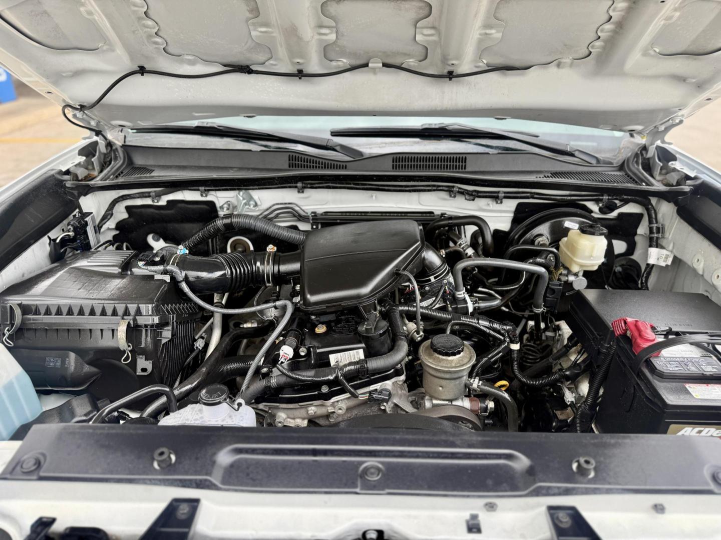 2016 Super White /Black/Caramel, cloth Black/Red, cloth Cement Gray, Toyota Tacoma 53500 (5TFRX5GN5GX) with an 2.7L L4 DOHC 16V engine, 6-Speed Automatic transmission, located at 2401 E Main St., Grand Prairie, TX, 75050, (972) 262-4440, 32.748981, -96.969643 - Photo#16