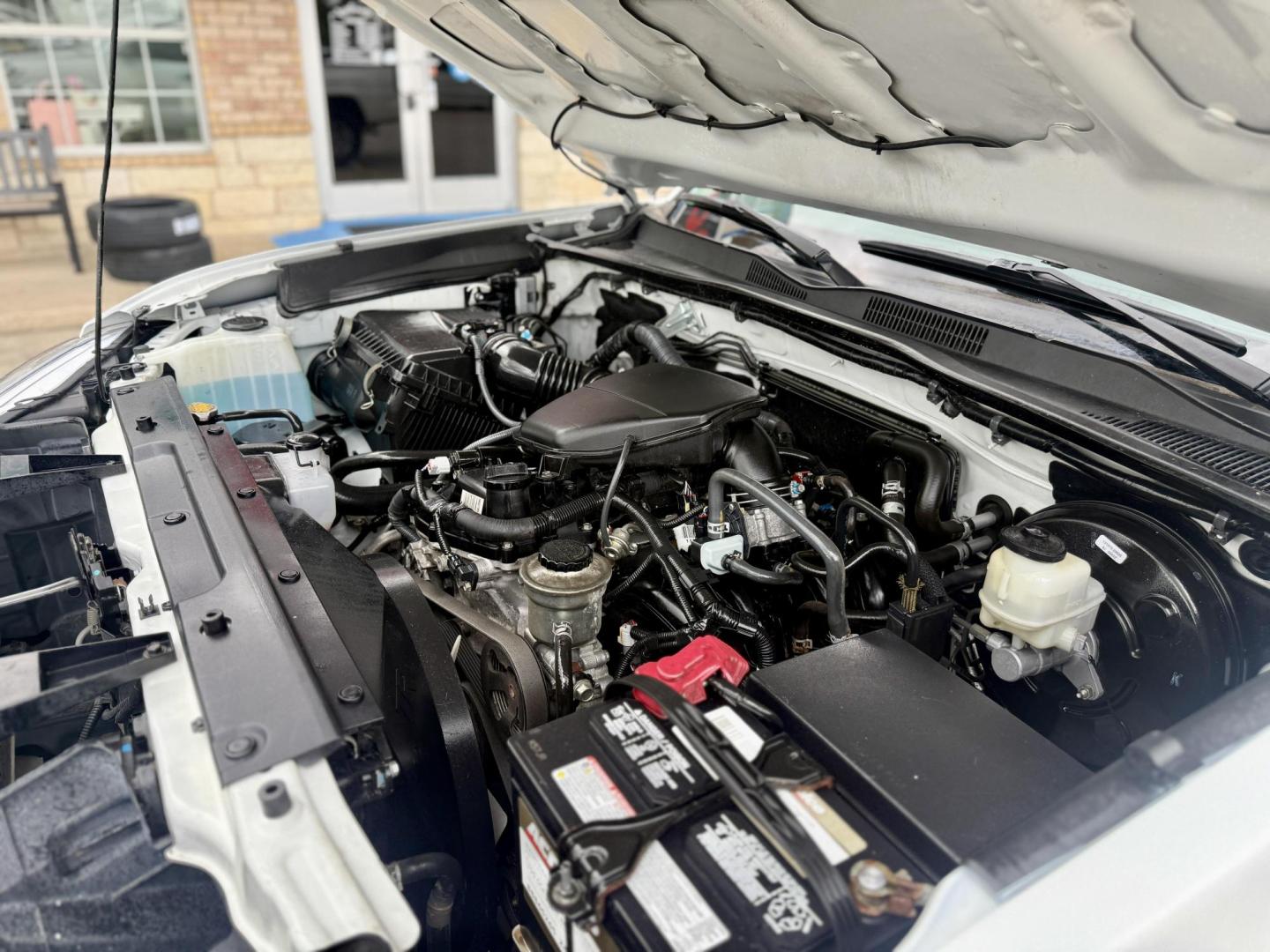 2016 Super White /Black/Caramel, cloth Black/Red, cloth Cement Gray, Toyota Tacoma 53500 (5TFRX5GN5GX) with an 2.7L L4 DOHC 16V engine, 6-Speed Automatic transmission, located at 2401 E Main St., Grand Prairie, TX, 75050, (972) 262-4440, 32.748981, -96.969643 - Photo#17