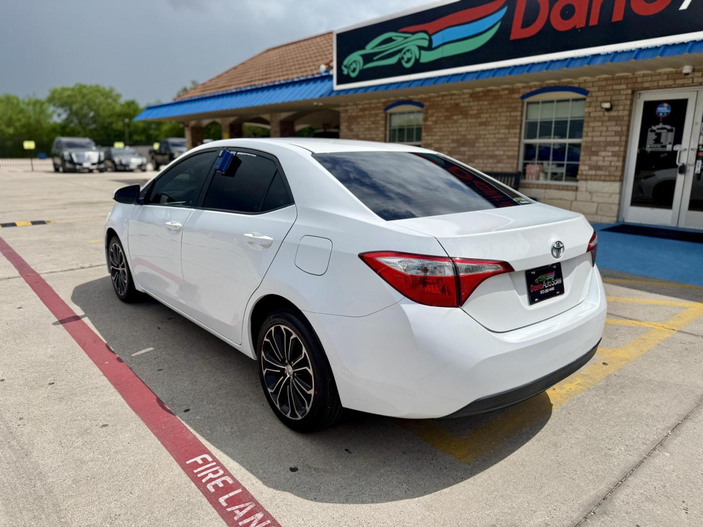 2016 Super White /Amber Fabric, cloth Ash Fabric, cloth Ivory Fabric Toyota Corolla 52980 (5YFBURHE3GP) with an 1.8L L4 DOHC 16V engine, Continuously Variable Transmission transmission, located at 2401 E Main St., Grand Prairie, TX, 75050, (972) 262-4440, 32.748981, -96.969643 - Photo#2