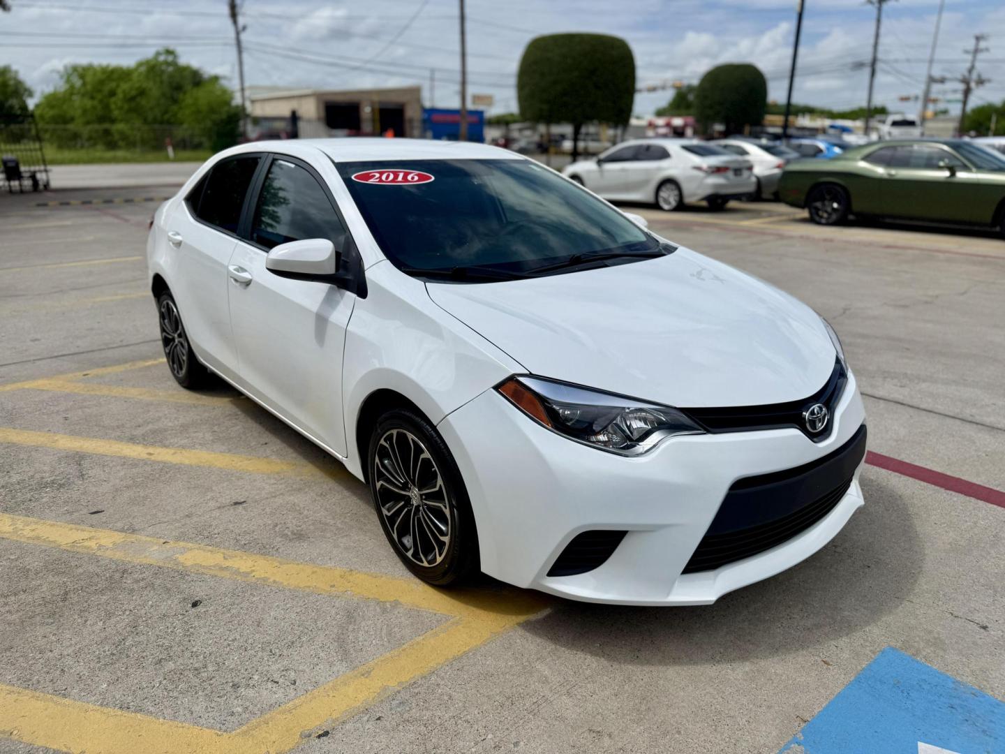 2016 Super White /Amber Fabric, cloth Ash Fabric, cloth Ivory Fabric Toyota Corolla 52980 (5YFBURHE3GP) with an 1.8L L4 DOHC 16V engine, Continuously Variable Transmission transmission, located at 2401 E Main St., Grand Prairie, TX, 75050, (972) 262-4440, 32.748981, -96.969643 - Photo#6