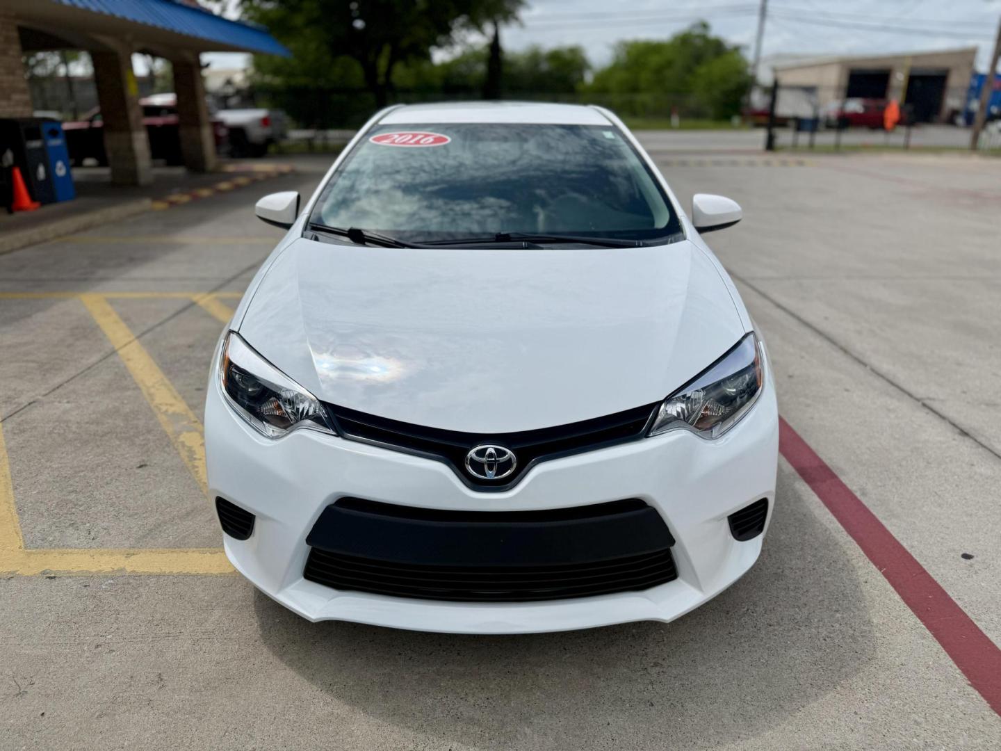 2016 Super White /Amber Fabric, cloth Ash Fabric, cloth Ivory Fabric Toyota Corolla 52980 (5YFBURHE3GP) with an 1.8L L4 DOHC 16V engine, Continuously Variable Transmission transmission, located at 2401 E Main St., Grand Prairie, TX, 75050, (972) 262-4440, 32.748981, -96.969643 - Photo#7