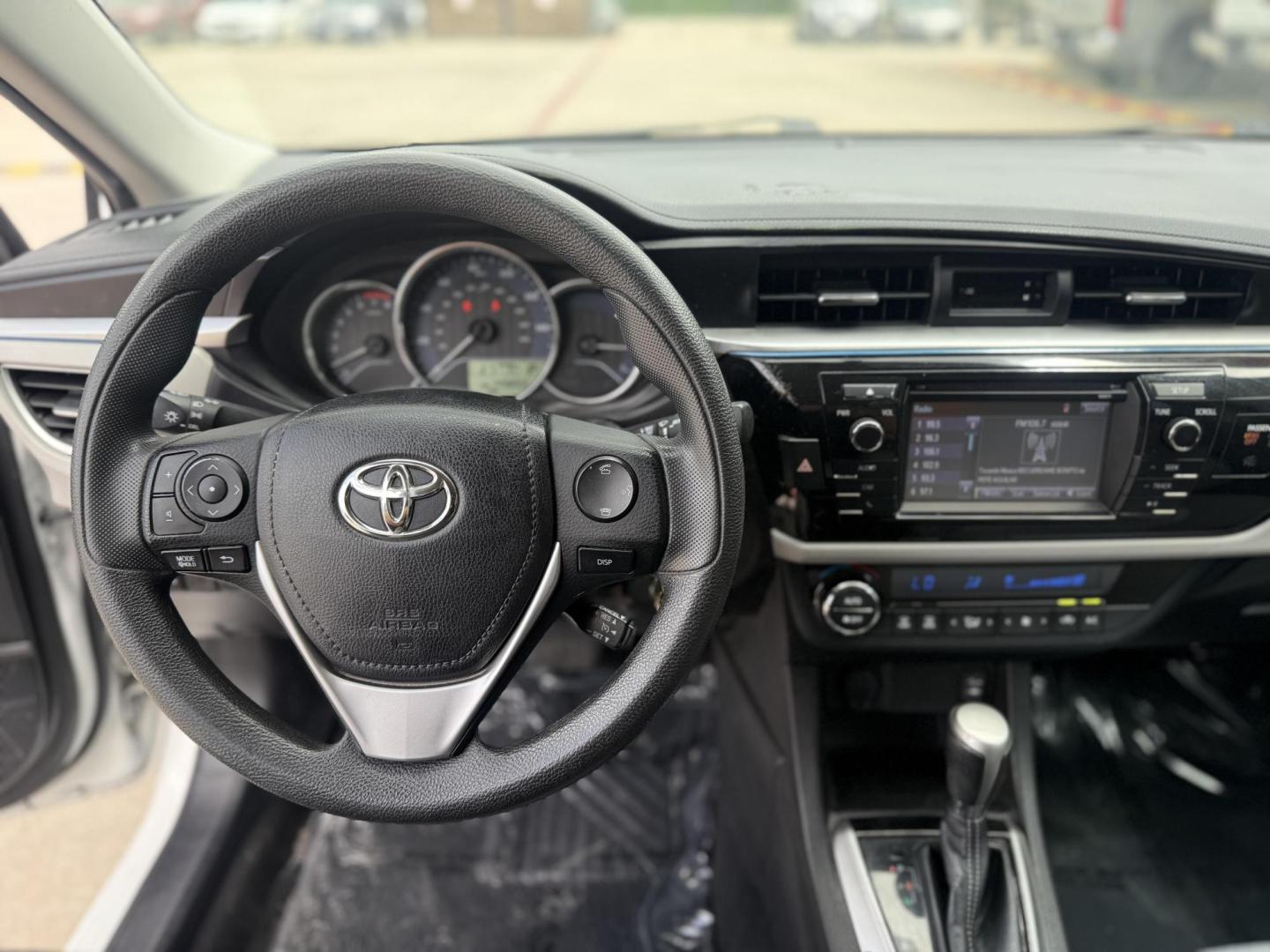 2016 Super White /Amber Fabric, cloth Ash Fabric, cloth Ivory Fabric Toyota Corolla 52980 (5YFBURHE3GP) with an 1.8L L4 DOHC 16V engine, Continuously Variable Transmission transmission, located at 2401 E Main St., Grand Prairie, TX, 75050, (972) 262-4440, 32.748981, -96.969643 - Photo#12