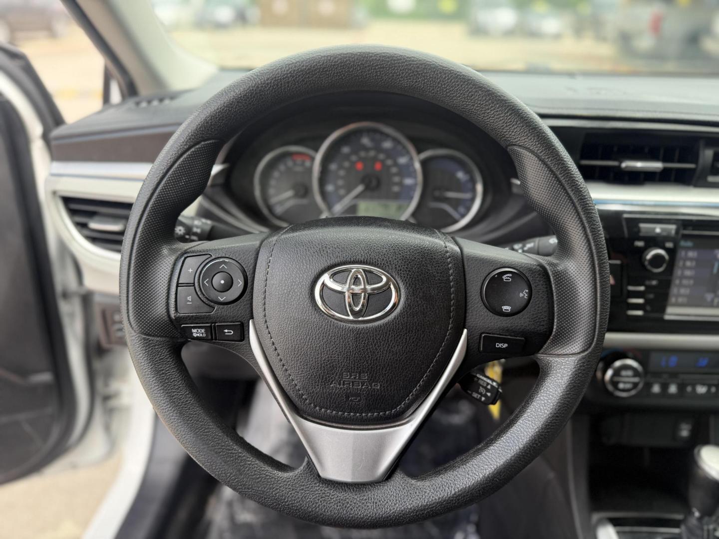 2016 Super White /Amber Fabric, cloth Ash Fabric, cloth Ivory Fabric Toyota Corolla 52980 (5YFBURHE3GP) with an 1.8L L4 DOHC 16V engine, Continuously Variable Transmission transmission, located at 2401 E Main St., Grand Prairie, TX, 75050, (972) 262-4440, 32.748981, -96.969643 - Photo#13