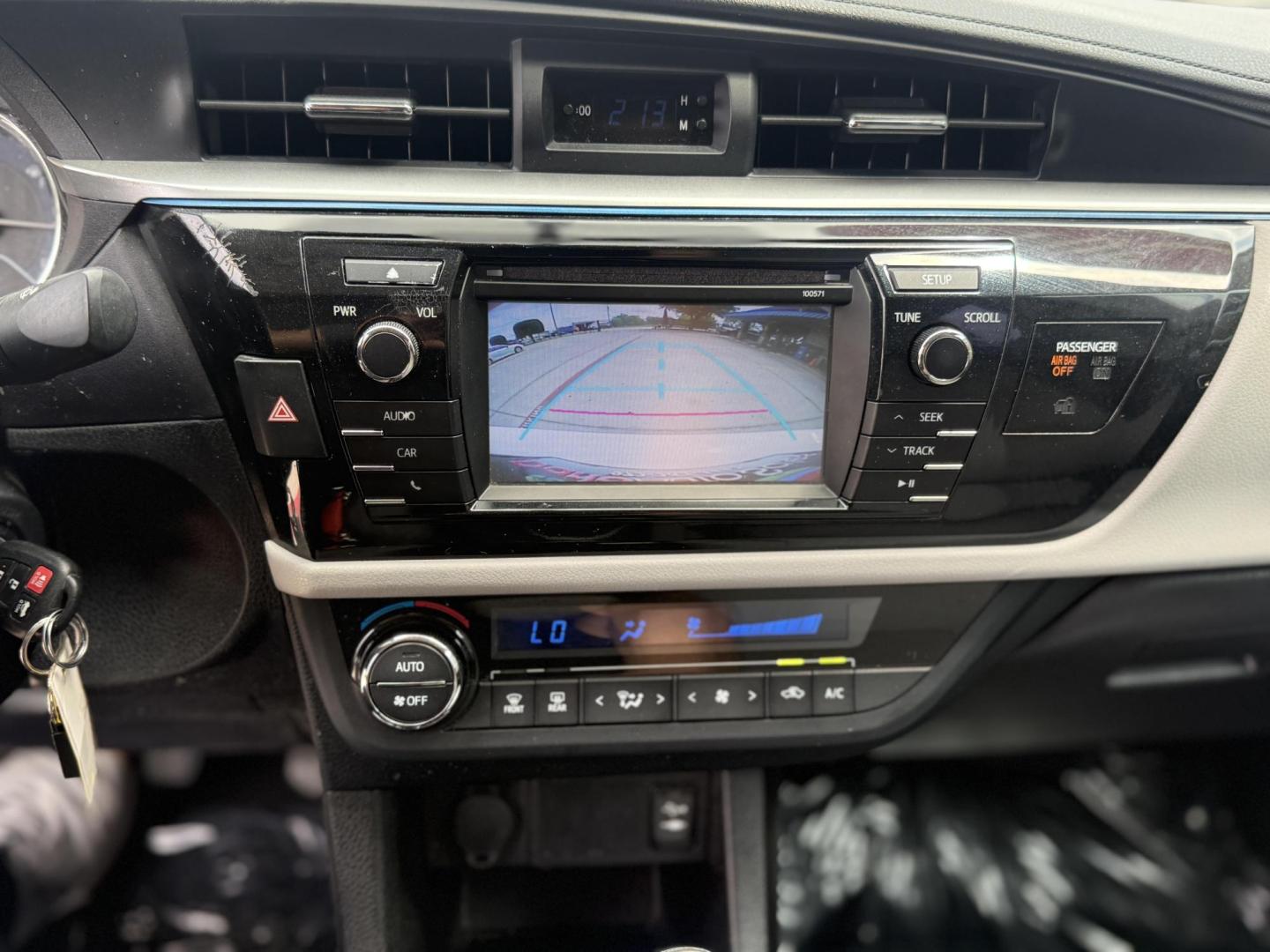 2016 Super White /Amber Fabric, cloth Ash Fabric, cloth Ivory Fabric Toyota Corolla 52980 (5YFBURHE3GP) with an 1.8L L4 DOHC 16V engine, Continuously Variable Transmission transmission, located at 2401 E Main St., Grand Prairie, TX, 75050, (972) 262-4440, 32.748981, -96.969643 - Photo#16