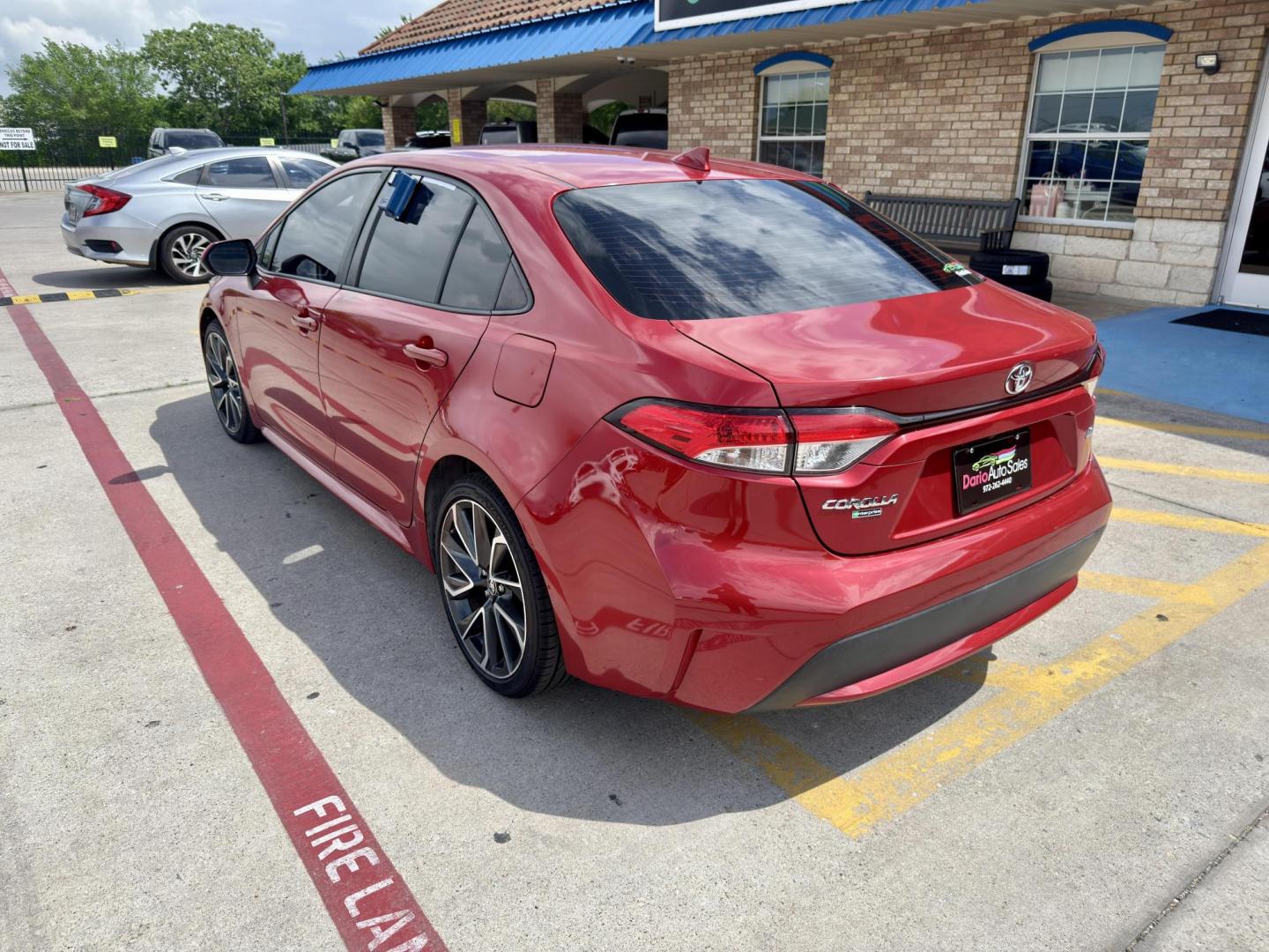 2020 Barcelona Red Metallic /Black, premium cloth Light Gray, premium cloth Mac Toyota Corolla 69675 (JTDEPRAE7LJ) with an 1.8L L4 DOHC 16V engine, Continuously Variable Transmission transmission, located at 2401 E Main St., Grand Prairie, TX, 75050, (972) 262-4440, 32.748981, -96.969643 - Photo#2