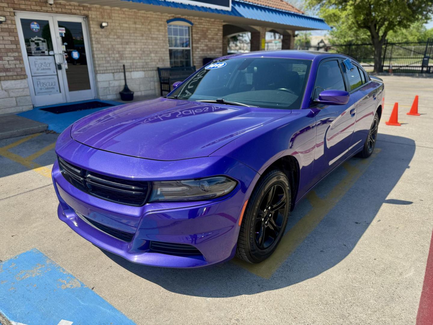 2019 Plum Crazy Pearl Coat /Black, cloth Black, leather Black/Brazen Gold, lea Dodge Charger 65048 (2C3CDXBG4KH) with an 3.6L V6 DOHC 24V engine, 8-Speed Automatic transmission, located at 2401 E Main St., Grand Prairie, TX, 75050, (972) 262-4440, 32.748981, -96.969643 - Photo#0