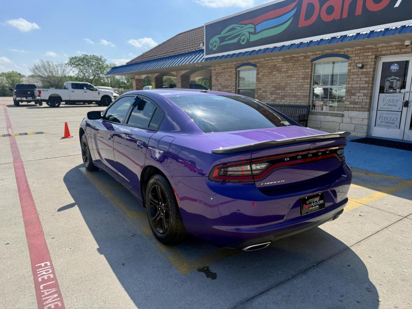 2019 Plum Crazy Pearl Coat /Black, cloth Black, leather Black/Brazen Gold, lea Dodge Charger 65048 (2C3CDXBG4KH) with an 3.6L V6 DOHC 24V engine, 8-Speed Automatic transmission, located at 2401 E Main St., Grand Prairie, TX, 75050, (972) 262-4440, 32.748981, -96.969643 - Photo#2