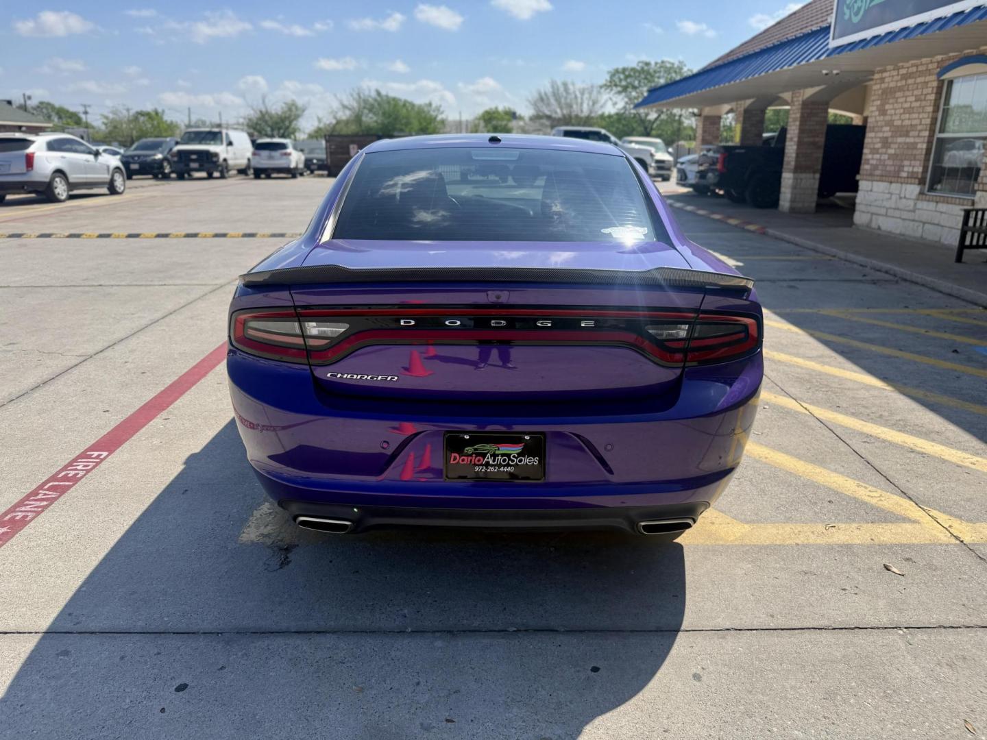 2019 Plum Crazy Pearl Coat /Black, cloth Black, leather Black/Brazen Gold, lea Dodge Charger 65048 (2C3CDXBG4KH) with an 3.6L V6 DOHC 24V engine, 8-Speed Automatic transmission, located at 2401 E Main St., Grand Prairie, TX, 75050, (972) 262-4440, 32.748981, -96.969643 - Photo#3