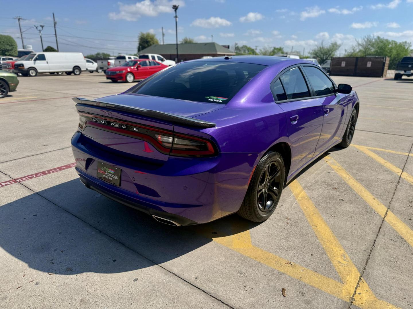 2019 Plum Crazy Pearl Coat /Black, cloth Black, leather Black/Brazen Gold, lea Dodge Charger 65048 (2C3CDXBG4KH) with an 3.6L V6 DOHC 24V engine, 8-Speed Automatic transmission, located at 2401 E Main St., Grand Prairie, TX, 75050, (972) 262-4440, 32.748981, -96.969643 - Photo#4