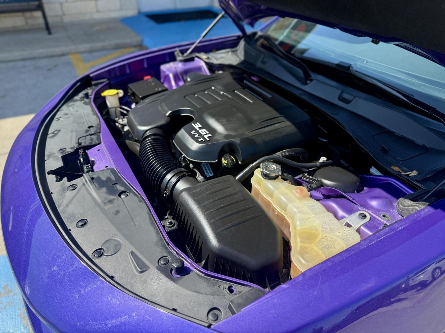 2019 Plum Crazy Pearl Coat /Black, cloth Black, leather Black/Brazen Gold, lea Dodge Charger 65048 (2C3CDXBG4KH) with an 3.6L V6 DOHC 24V engine, 8-Speed Automatic transmission, located at 2401 E Main St., Grand Prairie, TX, 75050, (972) 262-4440, 32.748981, -96.969643 - Photo#20