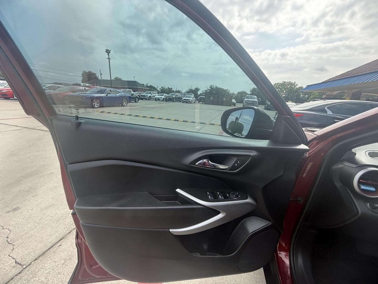 2024 /Jet Black/Gray w/Red Accents Chevrolet Trax 82597 (KL77LGE23RC) with an 1.2L L3 TURBO engine, 6-Speed Automatic transmission, located at 2401 E Main St., Grand Prairie, TX, 75050, (972) 262-4440, 32.748981, -96.969643 - Photo#0