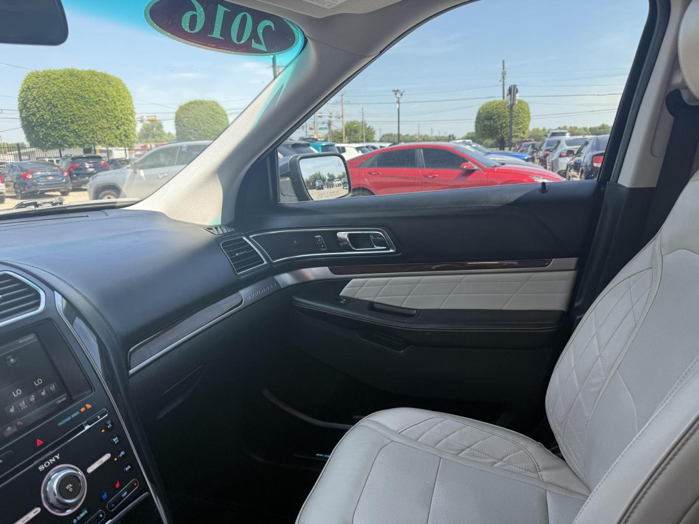2016 Absolute Black /Medium Soft Ceramic, premium leather Ford Explorer 51920 (1FM5K8HT6GG) with an 3.5L V6 DOHC 24V engine, 6-Speed Automatic transmission, located at 2401 E Main St., Grand Prairie, TX, 75050, (972) 262-4440, 32.748981, -96.969643 - Photo#4