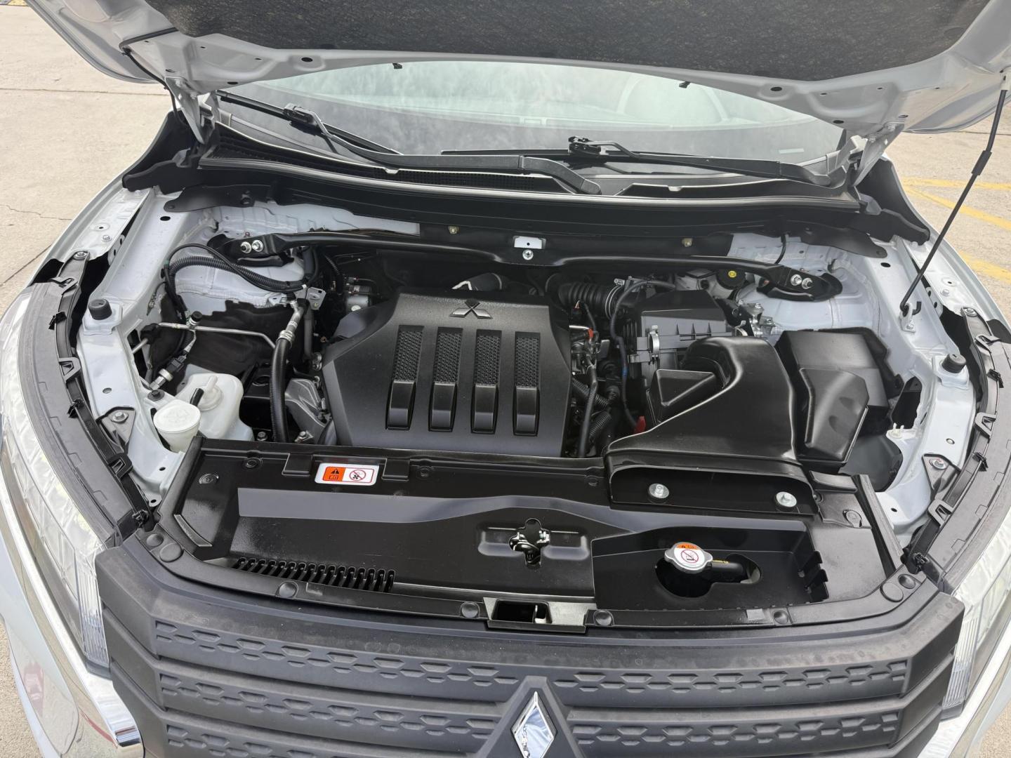 2022 White Diamond /Black Mitsubishi Eclipse Cross 76124 (JA4ATVAA2NZ) with an 1.5L L4 DOHC 16V engine, Continuously Variable Transmission transmission, located at 2401 E Main St., Grand Prairie, TX, 75050, (972) 262-4440, 32.748981, -96.969643 - Photo#17