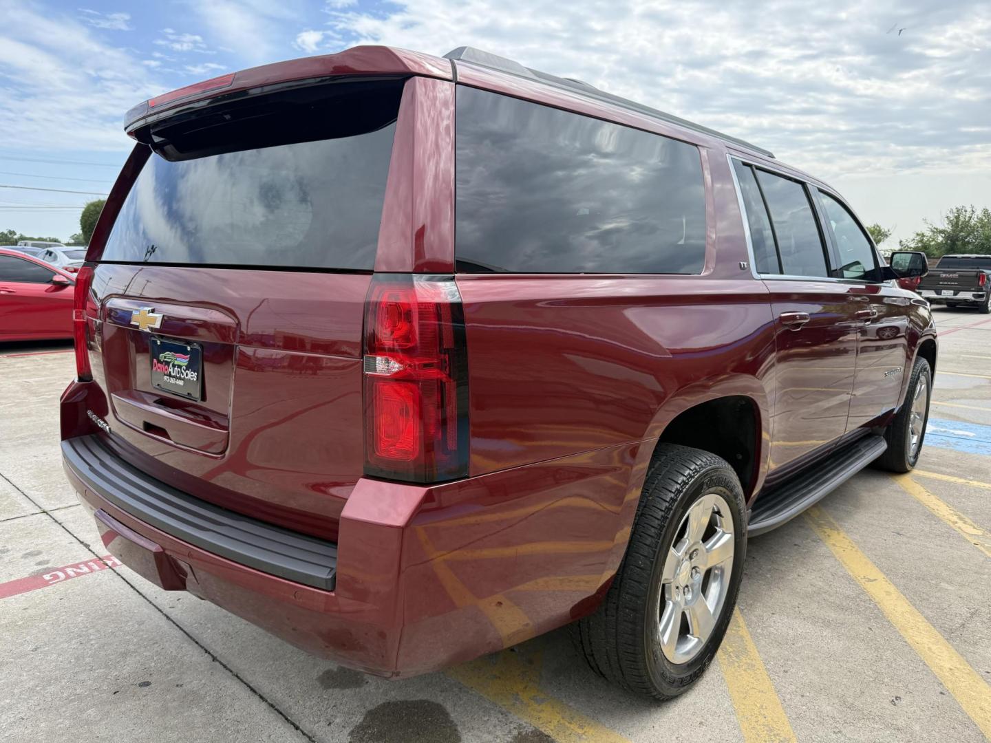 2020 Siren Red Tintcoat /Cocoa/Dune, leather Jet Black, leather Jet Black/D Chevrolet Suburban 70487 (1GNSCHKC8LR) with an 5.3L V8 OHV 16V engine, 6-Speed Automatic transmission, located at 2401 E Main St., Grand Prairie, TX, 75050, (972) 262-4440, 32.748981, -96.969643 - Photo#1