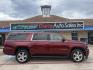 2020 Siren Red Tintcoat /Cocoa/Dune, leather Jet Black, leather Jet Black/D Chevrolet Suburban 70487 (1GNSCHKC8LR) with an 5.3L V8 OHV 16V engine, 6-Speed Automatic transmission, located at 2401 E Main St., Grand Prairie, TX, 75050, (972) 262-4440, 32.748981, -96.969643 - Photo#15