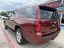 2020 Siren Red Tintcoat /Cocoa/Dune, leather Jet Black, leather Jet Black/D Chevrolet Suburban 70487 (1GNSCHKC8LR) with an 5.3L V8 OHV 16V engine, 6-Speed Automatic transmission, located at 2401 E Main St., Grand Prairie, TX, 75050, (972) 262-4440, 32.748981, -96.969643 - Photo#28
