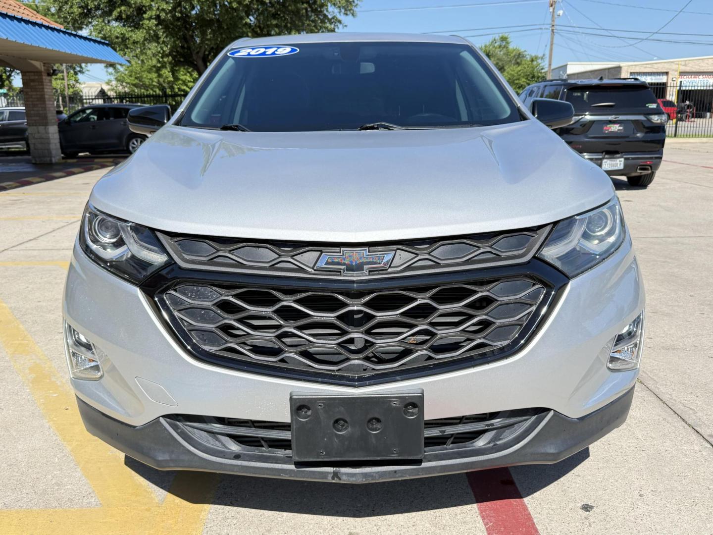 2019 Silver Ice Metallic /Jet Black, premium cloth Jet Black/Cinnamon, cloth Chevrolet Equinox 63877 (2GNAXLEX4K6) with an 2.0L L4 DOHC 16V engine, 9-Speed Automatic transmission, located at 2401 E Main St., Grand Prairie, TX, 75050, (972) 262-4440, 32.748981, -96.969643 - Photo#19
