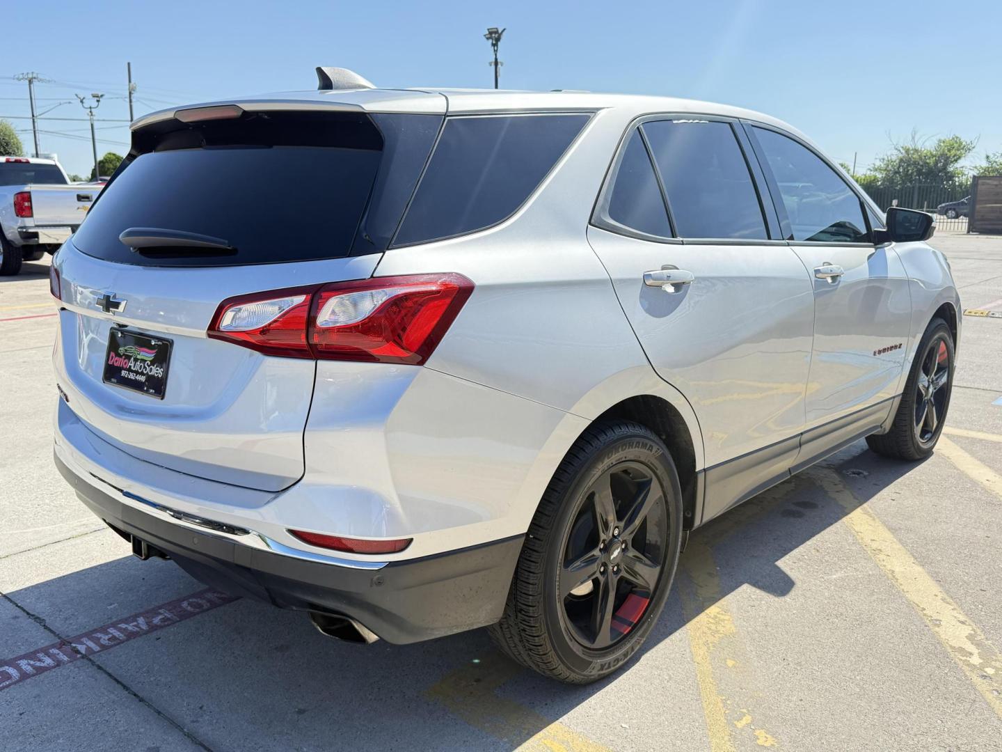 2019 Silver Ice Metallic /Jet Black, premium cloth Jet Black/Cinnamon, cloth Chevrolet Equinox 63877 (2GNAXLEX4K6) with an 2.0L L4 DOHC 16V engine, 9-Speed Automatic transmission, located at 2401 E Main St., Grand Prairie, TX, 75050, (972) 262-4440, 32.748981, -96.969643 - Photo#21