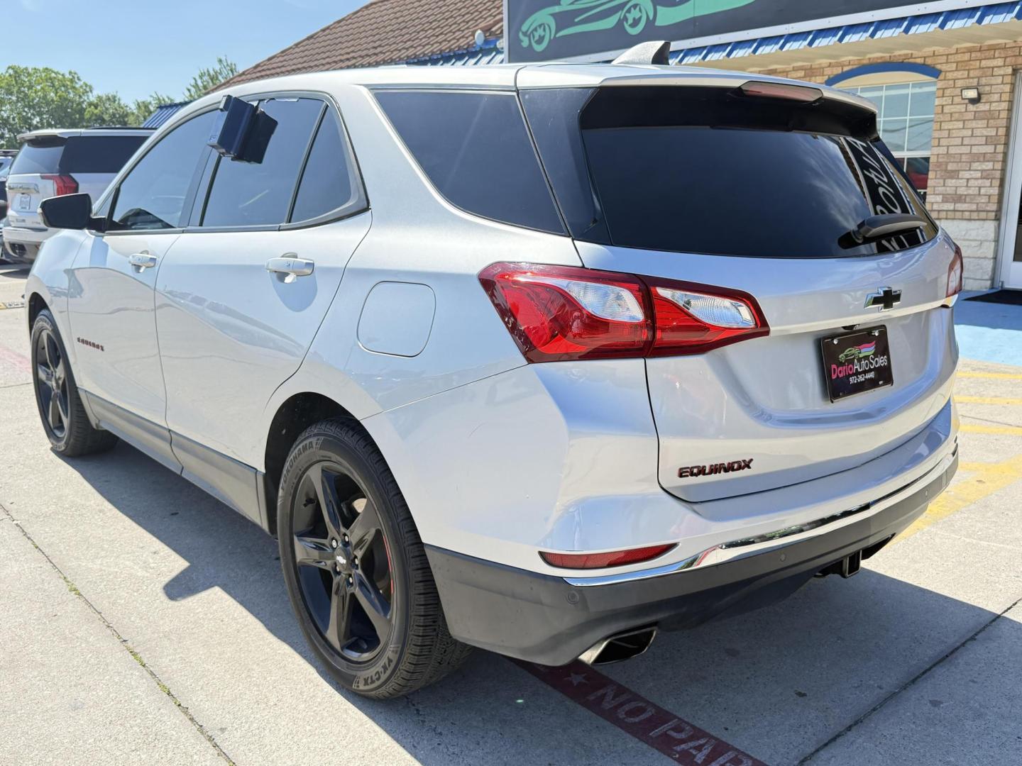 2019 Silver Ice Metallic /Jet Black, premium cloth Jet Black/Cinnamon, cloth Chevrolet Equinox 63877 (2GNAXLEX4K6) with an 2.0L L4 DOHC 16V engine, 9-Speed Automatic transmission, located at 2401 E Main St., Grand Prairie, TX, 75050, (972) 262-4440, 32.748981, -96.969643 - Photo#22