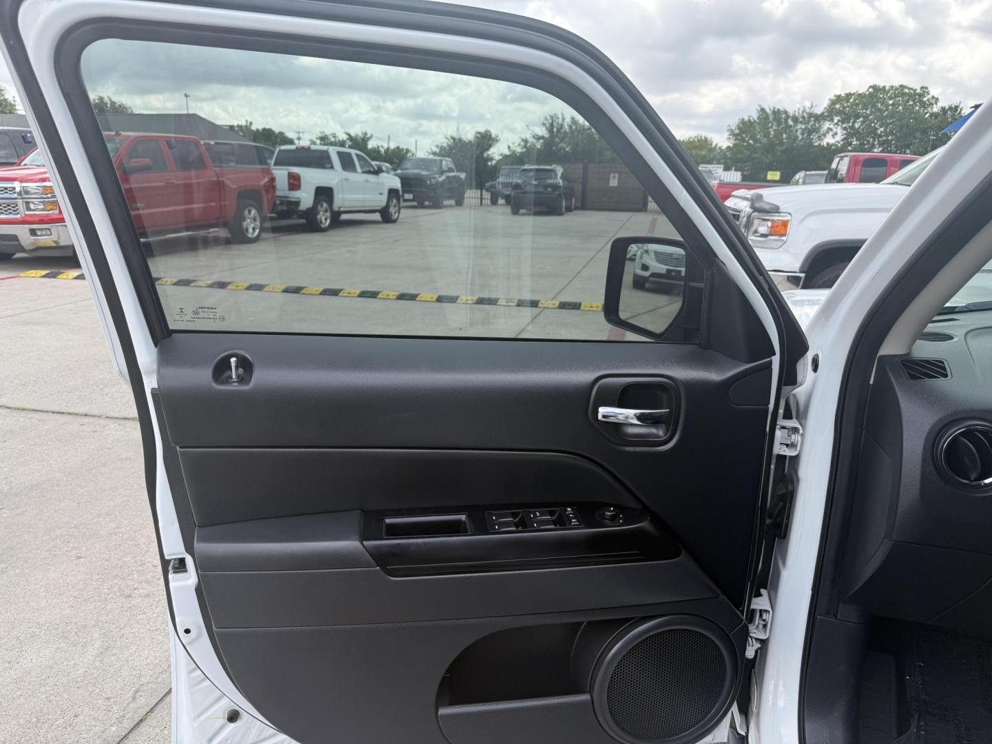 2017 White Knuckle Clear Coat /Dark Slate Gray, premium cloth Dark Slate Gray/Lig Jeep Patriot 55315 (1C4NJPBA1HD) with an 2.0L L4 DOHC 16V engine, Continuously Variable Transmission5-Speed Manual transmission, located at 2401 E Main St., Grand Prairie, TX, 75050, (972) 262-4440, 32.748981, -96.969643 - Photo#3