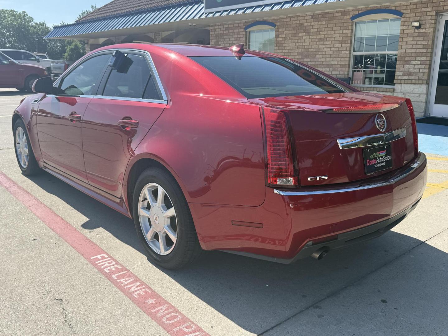 2011 Crystal Red Tintcoat /Cashmere and Cocoa Leather Interior Ebony Leather Cadillac CTS 41130 (1G6DE5EY6B0) with an 3.0L V6 DOHC 24V engine, 6-Speed Automatic6-Speed Manual transmission, located at 2401 E Main St., Grand Prairie, TX, 75050, (972) 262-4440, 32.748981, -96.969643 - Photo#7
