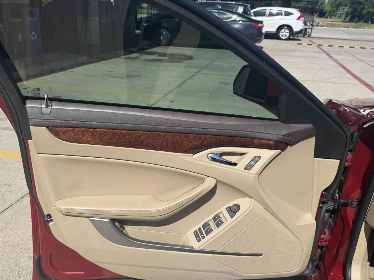 2011 Crystal Red Tintcoat /Cashmere and Cocoa Leather Interior Ebony Leather Cadillac CTS 41130 (1G6DE5EY6B0) with an 3.0L V6 DOHC 24V engine, 6-Speed Automatic6-Speed Manual transmission, located at 2401 E Main St., Grand Prairie, TX, 75050, (972) 262-4440, 32.748981, -96.969643 - Photo#24