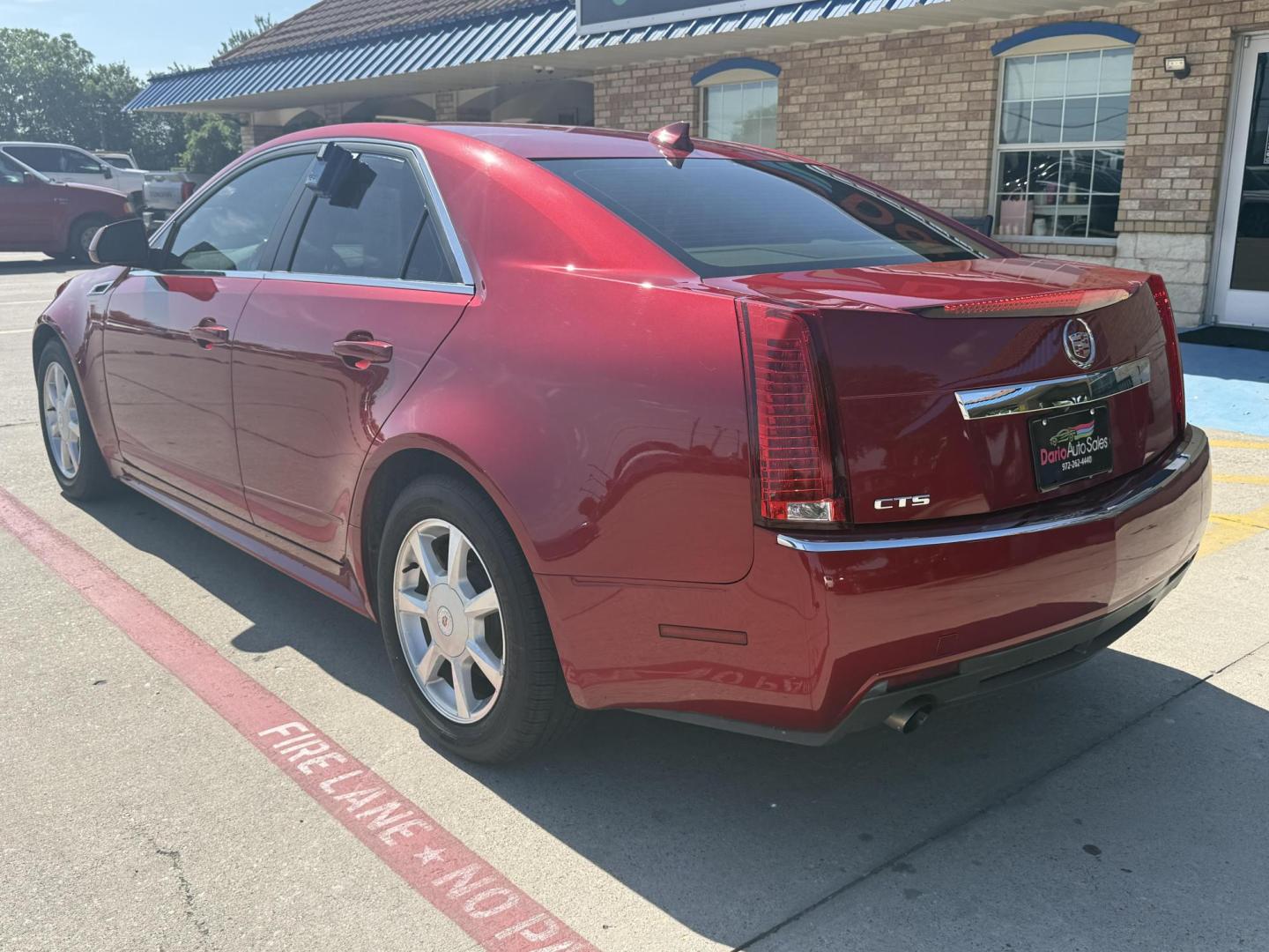 2011 Crystal Red Tintcoat /Cashmere and Cocoa Leather Interior Ebony Leather Cadillac CTS 41130 (1G6DE5EY6B0) with an 3.0L V6 DOHC 24V engine, 6-Speed Automatic6-Speed Manual transmission, located at 2401 E Main St., Grand Prairie, TX, 75050, (972) 262-4440, 32.748981, -96.969643 - Photo#26