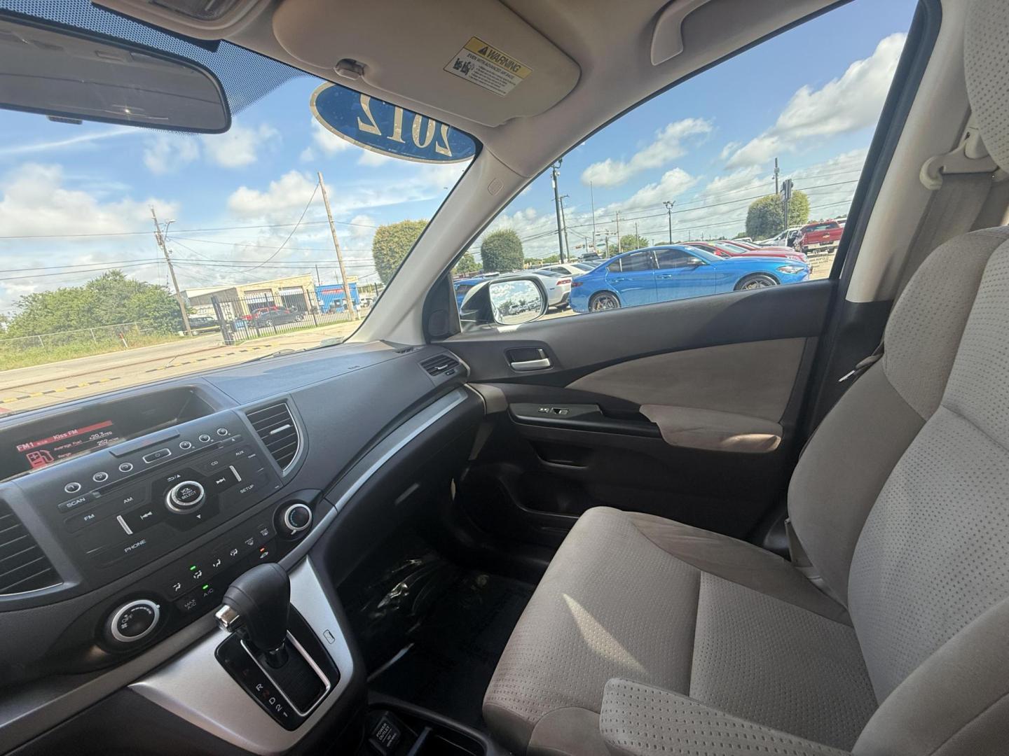2012 White Diamond Pearl /Beige Cloth Interior Black Cloth Interior Gray Clo Honda CR-V 44641 (5J6RM3H50CL) with an 2.4L L4 DOHC 16V engine, 5-Speed Automatic transmission, located at 2401 E Main St., Grand Prairie, TX, 75050, (972) 262-4440, 32.748981, -96.969643 - Photo#6