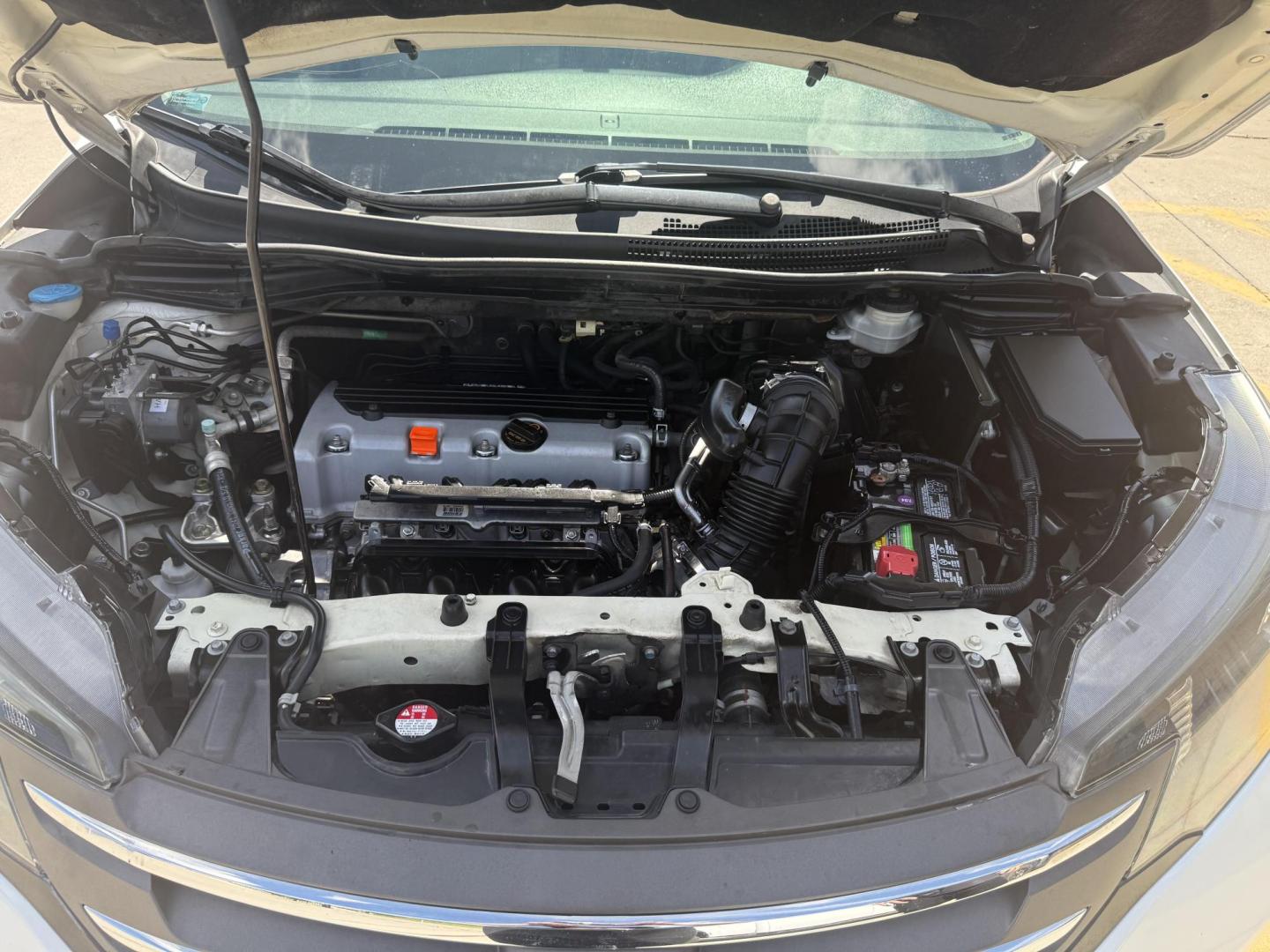 2012 White Diamond Pearl /Beige Cloth Interior Black Cloth Interior Gray Clo Honda CR-V 44641 (5J6RM3H50CL) with an 2.4L L4 DOHC 16V engine, 5-Speed Automatic transmission, located at 2401 E Main St., Grand Prairie, TX, 75050, (972) 262-4440, 32.748981, -96.969643 - Photo#7
