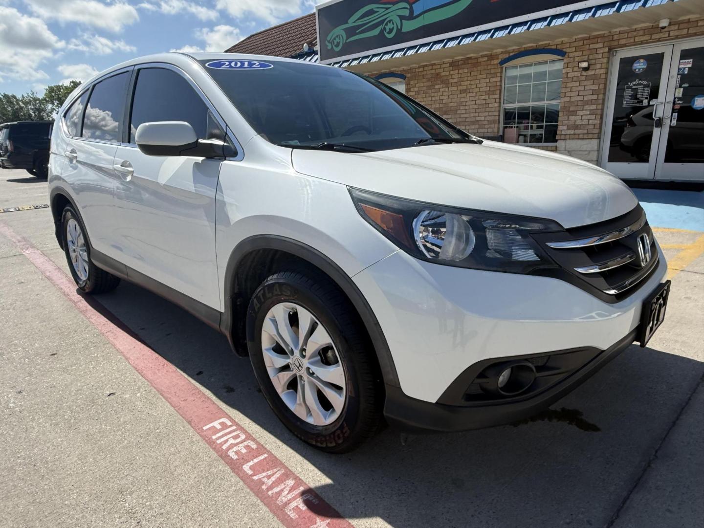 2012 White Diamond Pearl /Beige Cloth Interior Black Cloth Interior Gray Clo Honda CR-V 44641 (5J6RM3H50CL) with an 2.4L L4 DOHC 16V engine, 5-Speed Automatic transmission, located at 2401 E Main St., Grand Prairie, TX, 75050, (972) 262-4440, 32.748981, -96.969643 - Photo#27