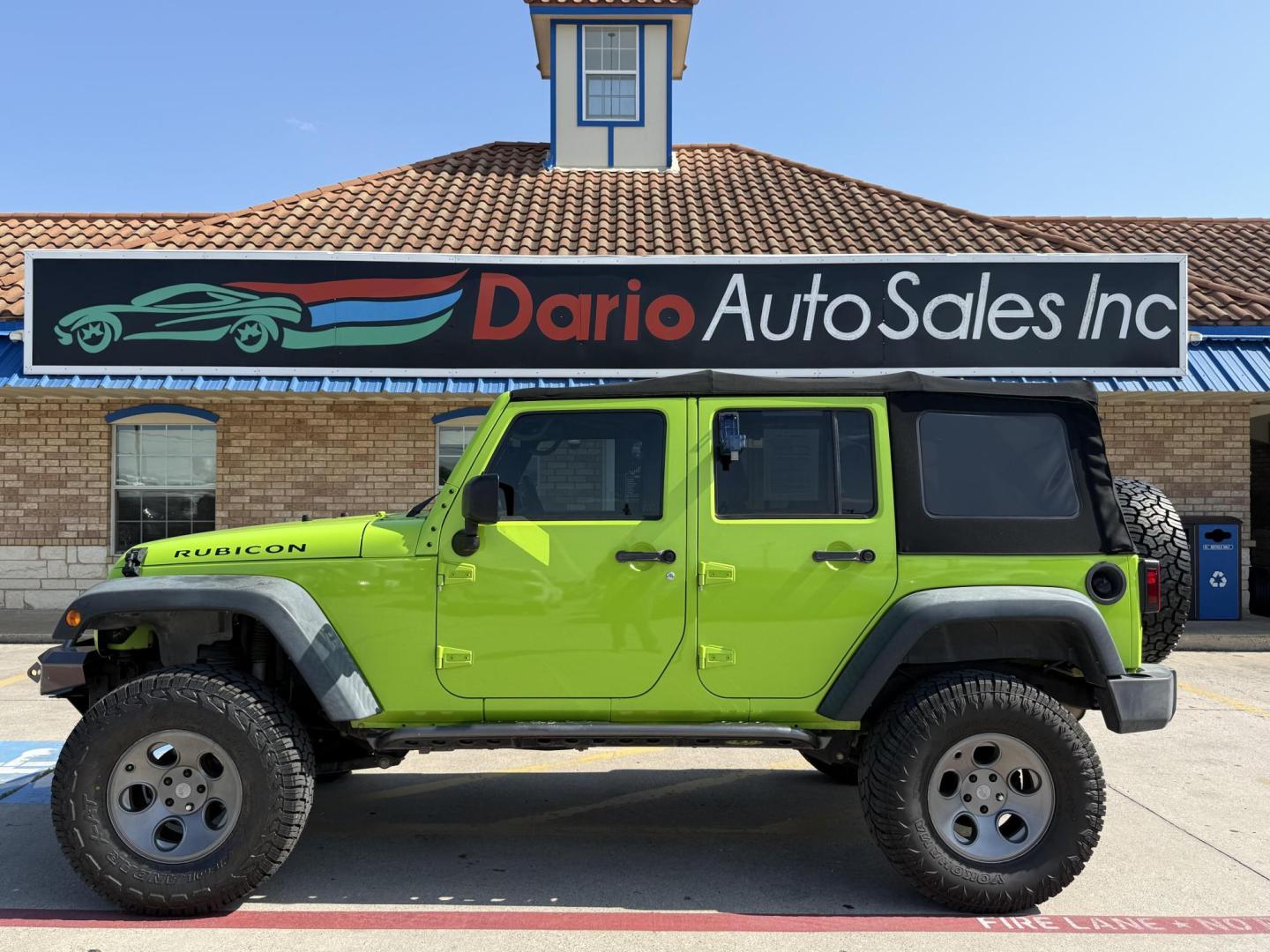 2013 Commando Green /Black Cloth Interior Black Leather Interior Black/ Jeep Wrangler 45733 (1C4BJWFG9DL) with an 3.6L V6 DOHC 24V FFV engine, 5-Speed Automatic6-Speed Manual transmission, located at 2401 E Main St., Grand Prairie, TX, 75050, (972) 262-4440, 32.748981, -96.969643 - Photo#0