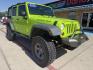 2013 Commando Green /Black Cloth Interior Black Leather Interior Black/ Jeep Wrangler 45733 (1C4BJWFG9DL) with an 3.6L V6 DOHC 24V FFV engine, 5-Speed Automatic6-Speed Manual transmission, located at 2401 E Main St., Grand Prairie, TX, 75050, (972) 262-4440, 32.748981, -96.969643 - Photo#2