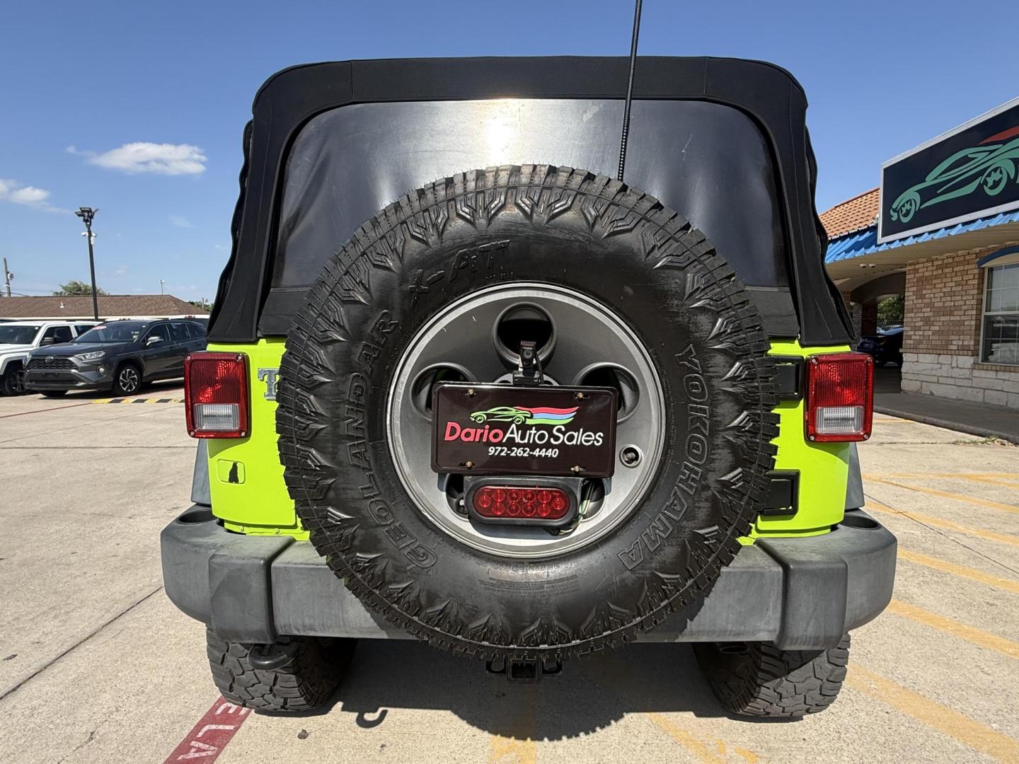 2013 Commando Green /Black Cloth Interior Black Leather Interior Black/ Jeep Wrangler 45733 (1C4BJWFG9DL) with an 3.6L V6 DOHC 24V FFV engine, 5-Speed Automatic6-Speed Manual transmission, located at 2401 E Main St., Grand Prairie, TX, 75050, (972) 262-4440, 32.748981, -96.969643 - Photo#3