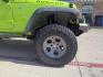 2013 Commando Green /Black Cloth Interior Black Leather Interior Black/ Jeep Wrangler 45733 (1C4BJWFG9DL) with an 3.6L V6 DOHC 24V FFV engine, 5-Speed Automatic6-Speed Manual transmission, located at 2401 E Main St., Grand Prairie, TX, 75050, (972) 262-4440, 32.748981, -96.969643 - Photo#5