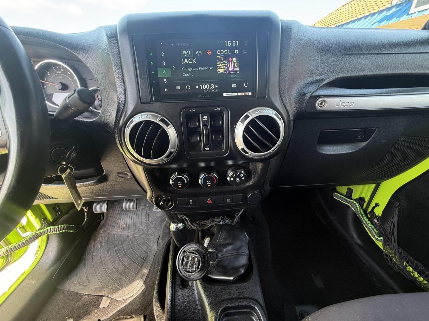 2013 Commando Green /Black Cloth Interior Black Leather Interior Black/ Jeep Wrangler 45733 (1C4BJWFG9DL) with an 3.6L V6 DOHC 24V FFV engine, 5-Speed Automatic6-Speed Manual transmission, located at 2401 E Main St., Grand Prairie, TX, 75050, (972) 262-4440, 32.748981, -96.969643 - Photo#7