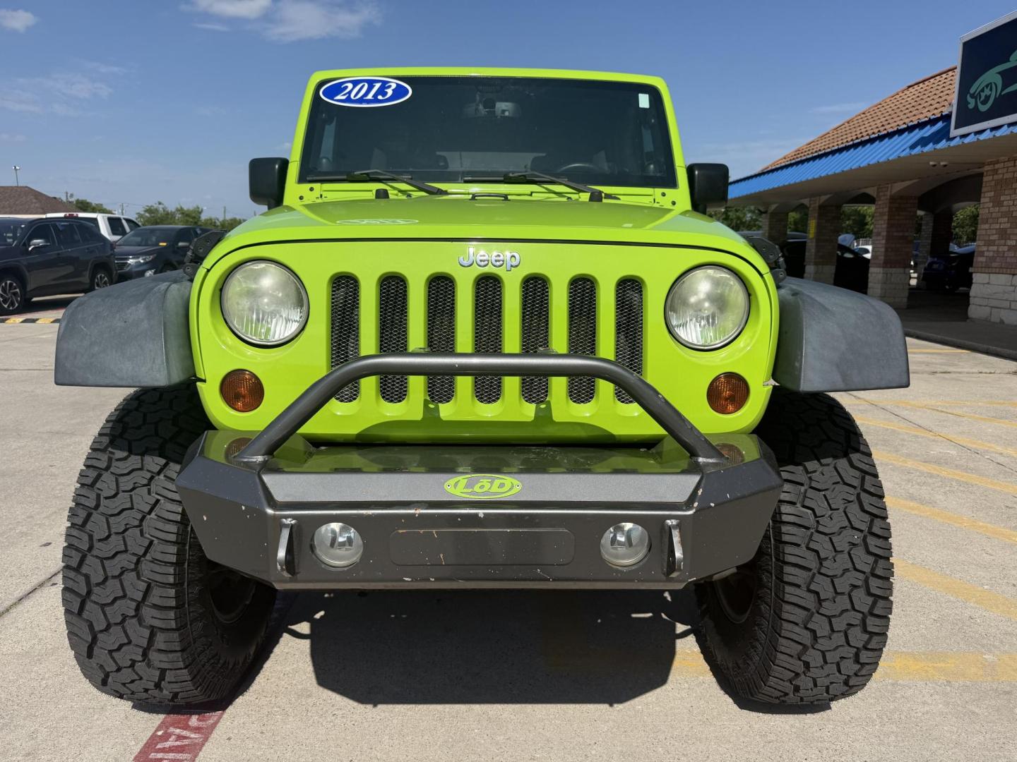 2013 Commando Green /Black Cloth Interior Black Leather Interior Black/ Jeep Wrangler 45733 (1C4BJWFG9DL) with an 3.6L V6 DOHC 24V FFV engine, 5-Speed Automatic6-Speed Manual transmission, located at 2401 E Main St., Grand Prairie, TX, 75050, (972) 262-4440, 32.748981, -96.969643 - Photo#9