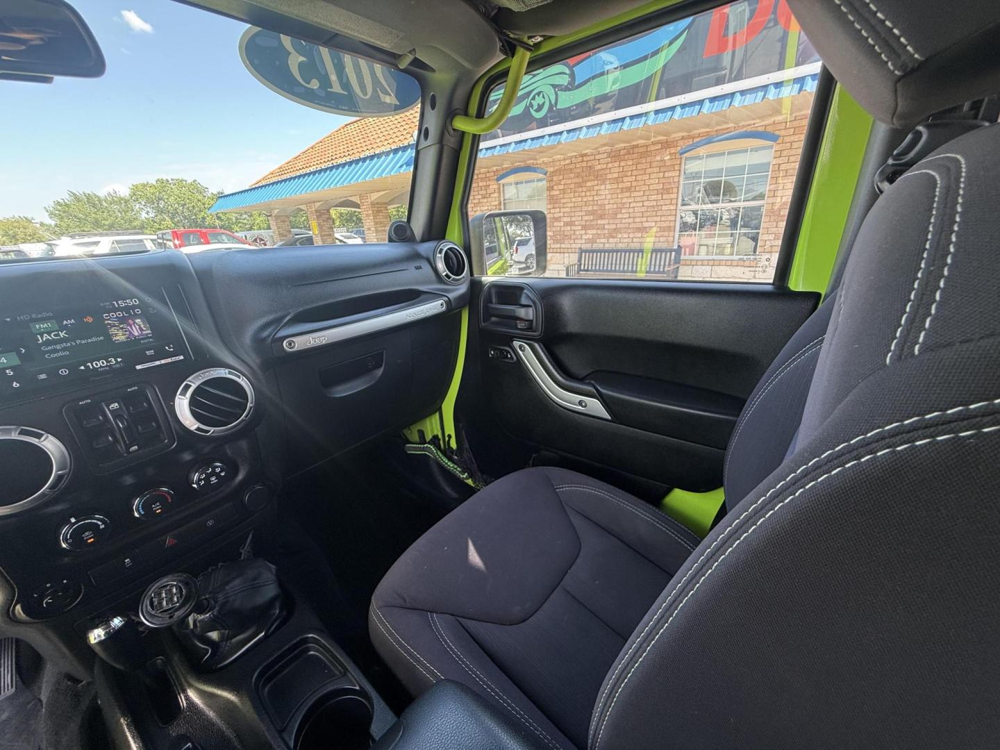 2013 Commando Green /Black Cloth Interior Black Leather Interior Black/ Jeep Wrangler 45733 (1C4BJWFG9DL) with an 3.6L V6 DOHC 24V FFV engine, 5-Speed Automatic6-Speed Manual transmission, located at 2401 E Main St., Grand Prairie, TX, 75050, (972) 262-4440, 32.748981, -96.969643 - Photo#10