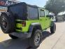 2013 Commando Green /Black Cloth Interior Black Leather Interior Black/ Jeep Wrangler 45733 (1C4BJWFG9DL) with an 3.6L V6 DOHC 24V FFV engine, 5-Speed Automatic6-Speed Manual transmission, located at 2401 E Main St., Grand Prairie, TX, 75050, (972) 262-4440, 32.748981, -96.969643 - Photo#16